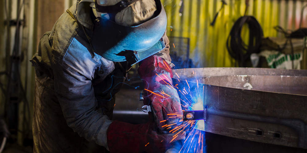 industrial worker welding.